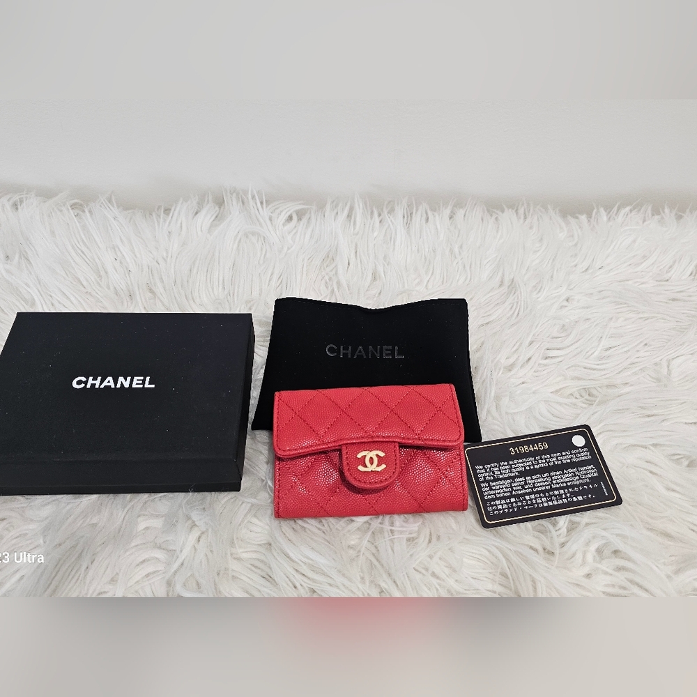 Classic Chanel Caviar leather, raspberry red.